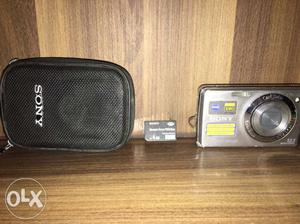 Silver Sony Point-and-shoot Camera With Case