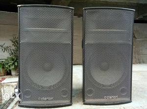 Two Black Clarion PA Speakers