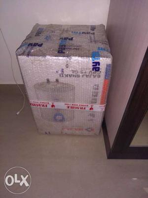 White And Blue Bajaj Shower Heater Box,Brand new Bajaj