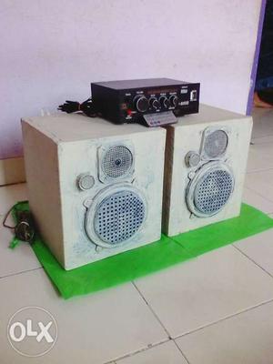Black And White Amplifier And Speaker Set