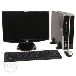 Black Computer Tower, Flat Screen Monitor, Keyboard And