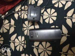 Black Nokia Phone With Charger