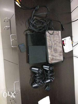 Black Sony PS2 Console With Two Corded Controllers