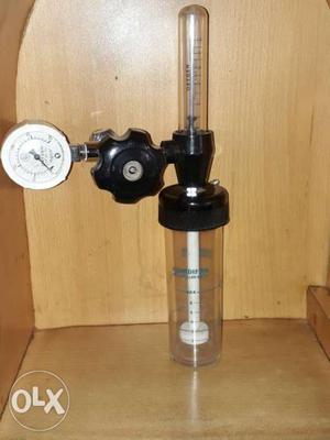 Clear And Black Plastic Measuring Device