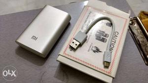 Gray Xiaomi Mi Power Bank And Gray USB Cable