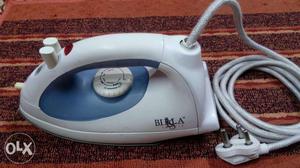 White And Blue Steam Clothes Iron