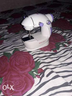 White And Purple Mini Electric Sewing Machine