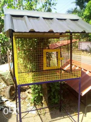 Yellow Metal Outdoor Pet Cage