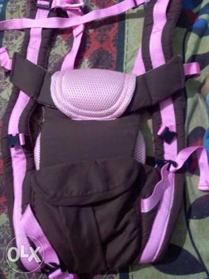 Baby's Black And Pink Backpack Carrier