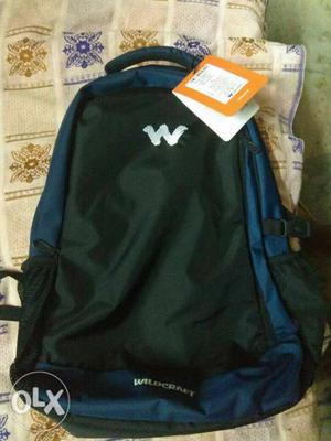 Black And Blue Wildcraft Backpack