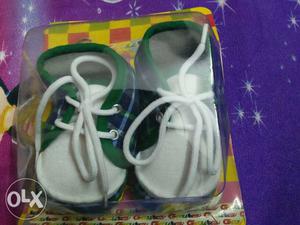 Pair Of Toddler's White Shoes