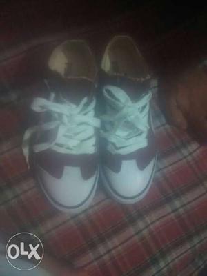 Pair Of Toddler's White-and-black Low-top Sneakers