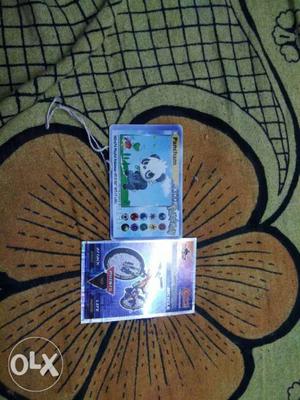 Two Trading Game Cards