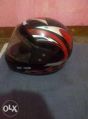 Black, White, And Red Full-face Helmet