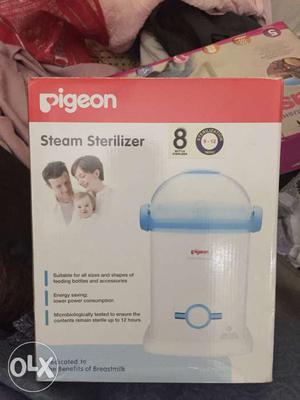 Brand new. Pigeon 8 baby bottle steam sterilizer. Unused