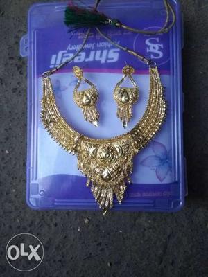 Gold-colored Long Necklace And Earrings