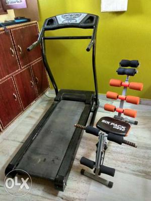 Gray And Black Treadmill And Orange And Black AB Crunch