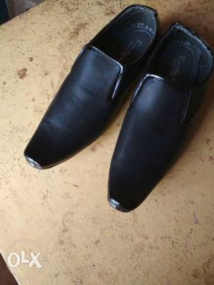 Pair Of Black Dress Shoes