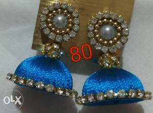 Pair Of Gold-colored And Blue Silk-thread Jhumka Earrings