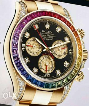 Round Black And Gold-colored Rolex Chronograph Watch