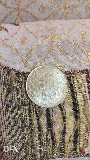 Round Gold-colored India Rupee Coin
