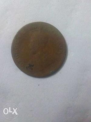 This in an annicent indian coin, king George v,
