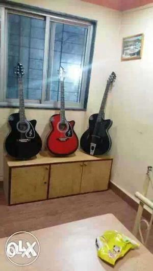 Three Acoustic Guitars