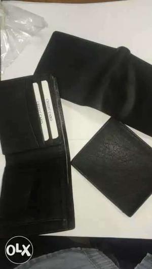 Three Black Leather Bi-fold Wallets