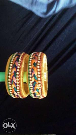 Two Green-and-brown Beaded Bangles