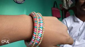Two Pink, Green, And Brown Silk Thread Bangles