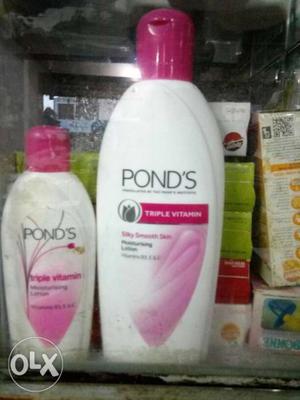 Two Pond's Lotion Bottles