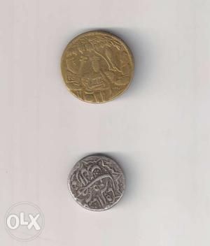 Two Round Gold And Silver-colored Mughal Coins