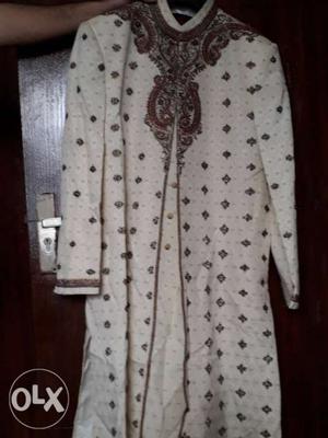 White And Brown Robe