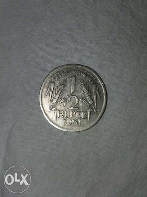  round old coin half rupee India