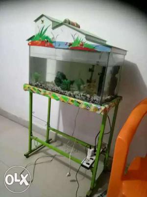 Fish tank with stand and few fish...