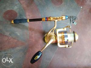 Gold And Black Spinning Fishing Reel