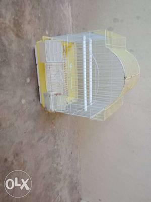 Small White And Yellow Metal Birdcage