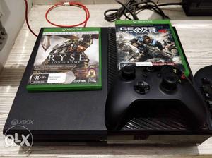 Black Xbox One Console With Controller And Two Games