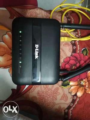 D-Link N300 Router with adapter and box. Just as