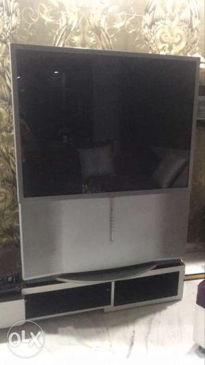 Gray And Black Rear Projection Television
