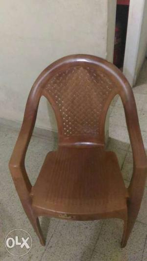 1 plastic chair sitting chair.