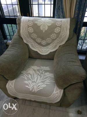 Brown Fabric Sofa Chair With Throw Pillow