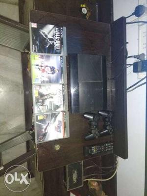 Ps3 with 4 game cd 5 months used negotiable