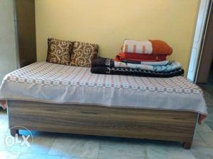 Single deewan bed with two boxes inside.