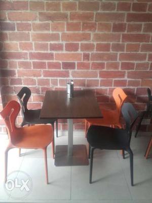 Steel Stand Table with 4 designer chairs. Perfect