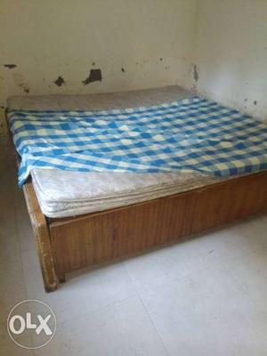 Strong bed along with 8 inch spring mattress
