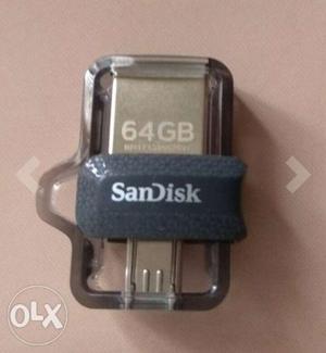 64 GB Gray And Silver SanDisk Thumb Drive