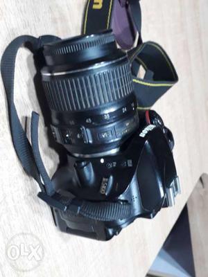 Black DSLR Nikon d with  lense & also HD