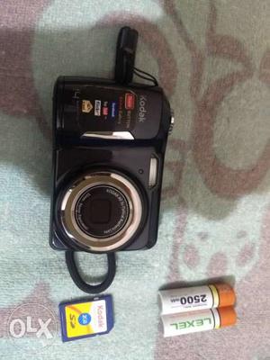 Black Kodak Point-and-shoot Camera With Batteries