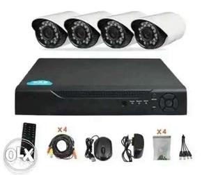 Four White Surveillance Cameras